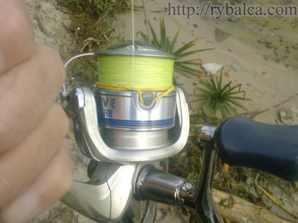 клипсуем леску на катушке фото1